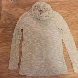 Lightweight cowl neck sweater in light peach.